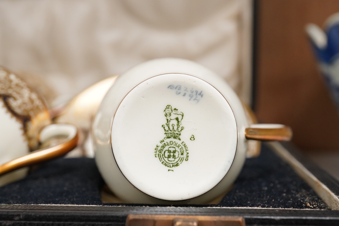A cased Royal Doulton coffee set